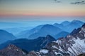 Glowing pink horizon and blue ridges, Karawanken range Austria Royalty Free Stock Photo