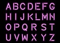 Glowing Pink Neon Alphabet isolated and transparent.