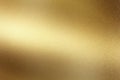 Glowing polished golden metal wall surface, abstract texture background Royalty Free Stock Photo