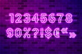 Glowing purple neon lamp numbers and special characters Royalty Free Stock Photo