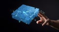 Glowing Puzzle Cube with Digital Data and Hand on Dark Background Royalty Free Stock Photo