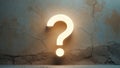 Glowing question mark on a textured wall Royalty Free Stock Photo