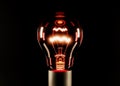 Glowing red incandescent lamp on a black background. 3D rendering and 3D illustration Royalty Free Stock Photo