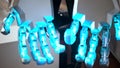 Glowing robot arms close up