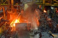 Glowing steel tube during production in a modern rolling mill in the industry Royalty Free Stock Photo