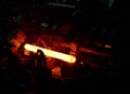 Glowing steel tube during production in a modern rolling mill in the industry Royalty Free Stock Photo