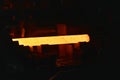 Glowing steel tube during production in a modern rolling mill in the industry Royalty Free Stock Photo