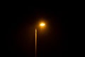 glowing street lamp at rainy night Royalty Free Stock Photo