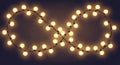 Glowing string lights arranged as an infinity symbol concept Royalty Free Stock Photo