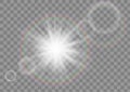 Glowing sun rays sparkle star with lens flare effect on transparent vector background. Royalty Free Stock Photo