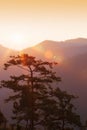 Glowing sunrise shines over mountains