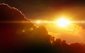 Glowing sunset, dark red clouds, bright sun rays Royalty Free Stock Photo