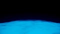 Glowing surface on black background. Animation. Moving on virtual surface of glowing planet. Bright holographic surface