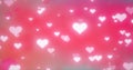 Glowing tender flying love hearts on a pink background