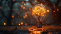 Glowing tree inside a light bulb in a mystical forest, creative concept Royalty Free Stock Photo