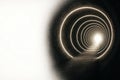 A glowing tunnel with rings leading to the light. Space for text. Royalty Free Stock Photo