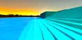 Glowing turquoise concrete staircase down to the pool. The steps visible under the transparent water at night. 3d rendering