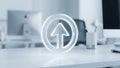 Glowing Upload Arrow Icon Symbolizing Digital Progress in Modern Office Royalty Free Stock Photo
