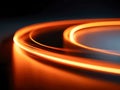 Glowing vibrant orange circular light trails on dark background creating an abstract modern design with dynamic energy and motion Royalty Free Stock Photo
