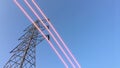 Glowing wires on electricity transmission towers Royalty Free Stock Photo