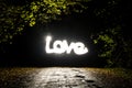 Glowing word love in the dark Freezelight