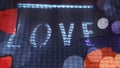 Glowing word love. Neon lighting effect.