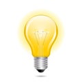 Glowing yellow light bulb as inspiration concept Royalty Free Stock Photo