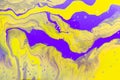 Glowing yellow and purple waves with gold inclusion. Abstract marble background or texture. Acrylic Fluid Art