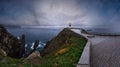 Glows Cape Ortegal Lighthouse Province of A Coruna, Galicia, Spain. Summer rainy late evening view Royalty Free Stock Photo