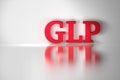 GLP red shiny letters reflected on the white surface. Royalty Free Stock Photo