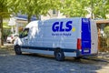 GLS parcel delivery van parked on a cobblestone street Royalty Free Stock Photo