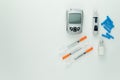 Glucometer and other blood sugar supplies.