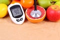 Glucometer, stethoscope and fresh fruits, diabetes, healthy lifestyles