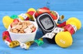 Glucometer with sugar level, healthy food, dumbbells and centimeter, diabetes, healthy and sporty lifestyle Royalty Free Stock Photo