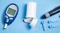 Glucometer with test strips and other objects. Devices for measuring of glucose in the blood Royalty Free Stock Photo