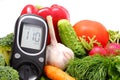 Glucose meter and fresh vegetables