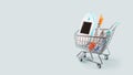 Glucose meter, test strips, syringes in a shopping trolley