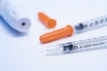 Insulin syringe and lancet for glucose test level. Royalty Free Stock Photo