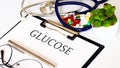 GLUCOSE text and Background of Medicaments  Stethoscope Royalty Free Stock Photo