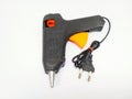 Glue gun: a tool for gluing glue by heating the tool using an electric heating element to melt the solid glue