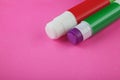 Glue Sticks on Pink Royalty Free Stock Photo