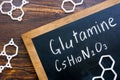 Glutamine amino acid formula on the blackboard. Royalty Free Stock Photo
