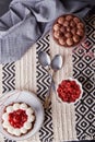 Gluten free dreamy escapism desserts with raspberry and cherry in portions flat lay