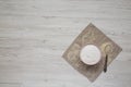 Gluten free rice flour in a pink bowl over white wooden background,  overhead view. Flat lay, top view, from above. Copy space Royalty Free Stock Photo