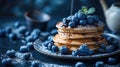 gluten free vegan blueberry pancakes, blueberries on top of pancakes and around, for the restaurant menu Royalty Free Stock Photo