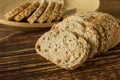 Gluten-free vegan bread and no animal products. Vegetarian bread with oatmeal, banana flavor, on a wooden rustic table, sliced and