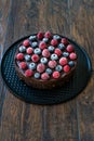 Gluten Free Vegan Chocolate Raw Cake with Raspberries and Blueberries Royalty Free Stock Photo