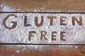 Gluten free word with wood background