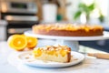 glutenfree almond orange cake with sliced almonds on top