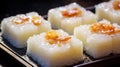 glutinous rice desserts cut Seasoned glutinous rice cakes, a sweet savory treat.AI Generated